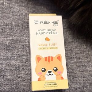 The Crème Shop Mango Fluff Hand Crème - White & Orange